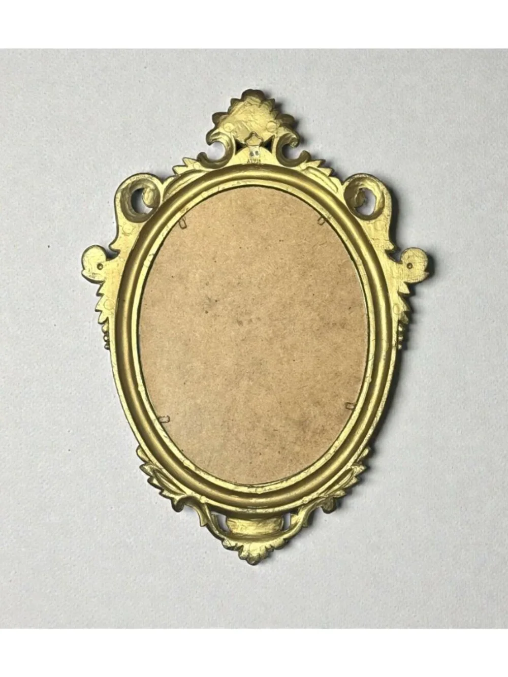 Ornate Gold Oval Mirror With Floral Details & Vintage Frame Design